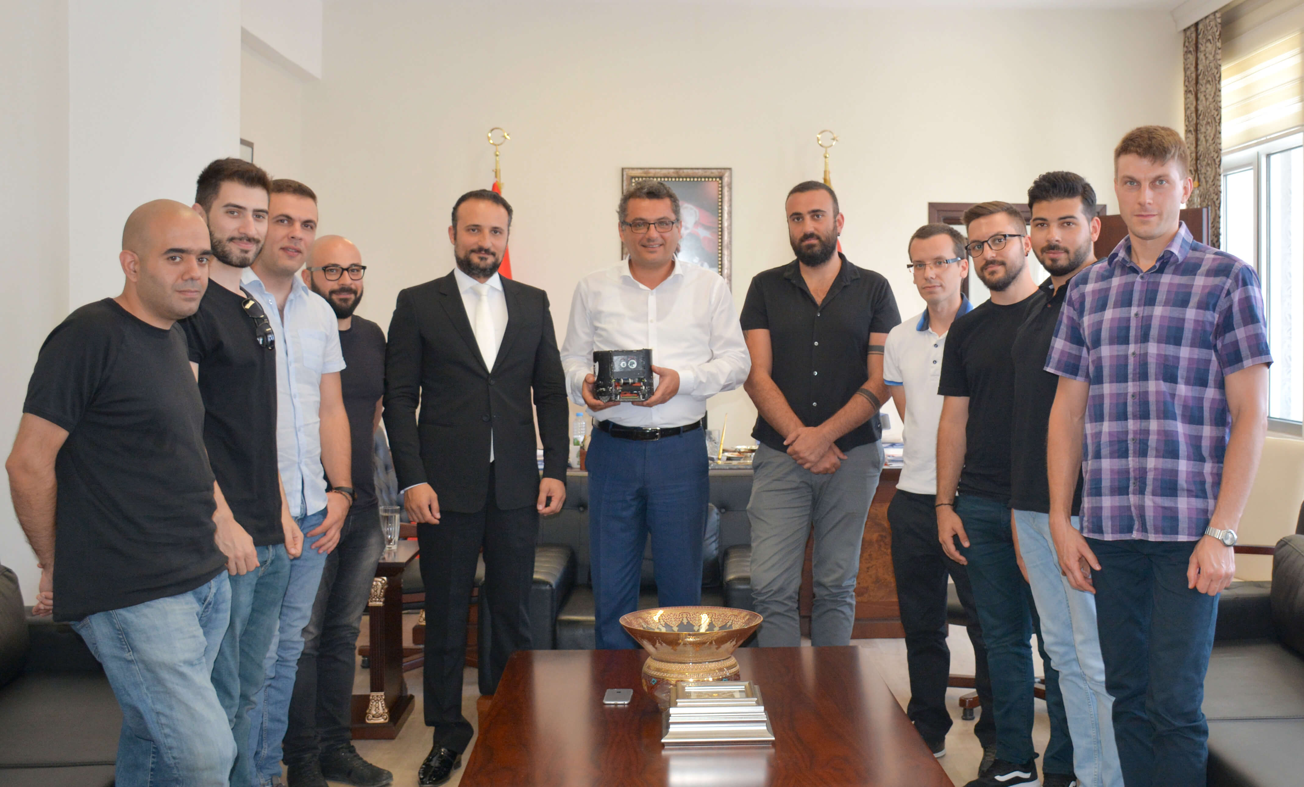 Information regarding the works that carried out in Near East University Robotic Laboratory on Autonomous (Unmanned) Bus was shared with the Prime Minister Tufan Erhürman