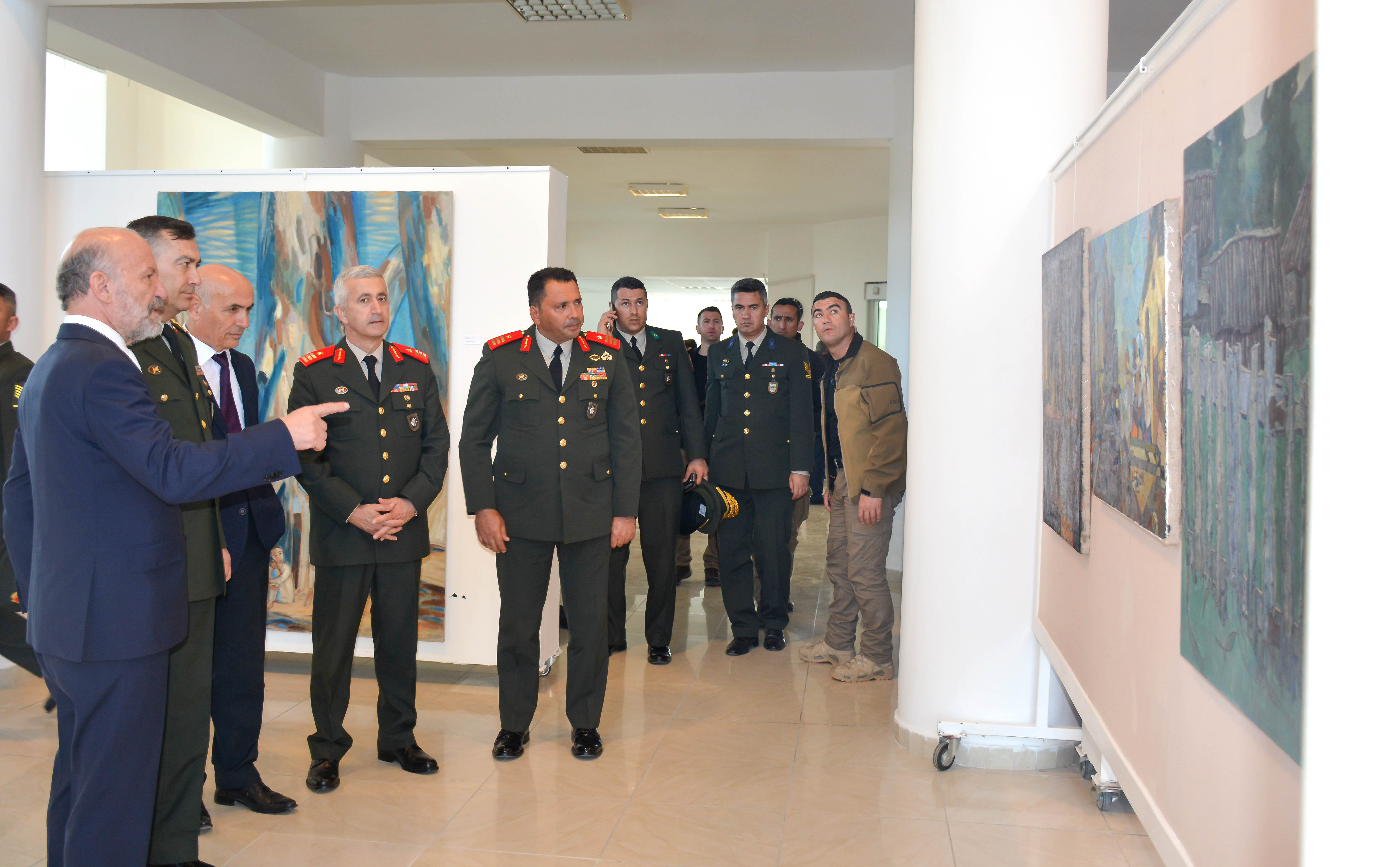 Major General Yıldırım, Brigadier General Algan and Brigadier General Volkan visited Five Exhibitions, which are on display at Near East University