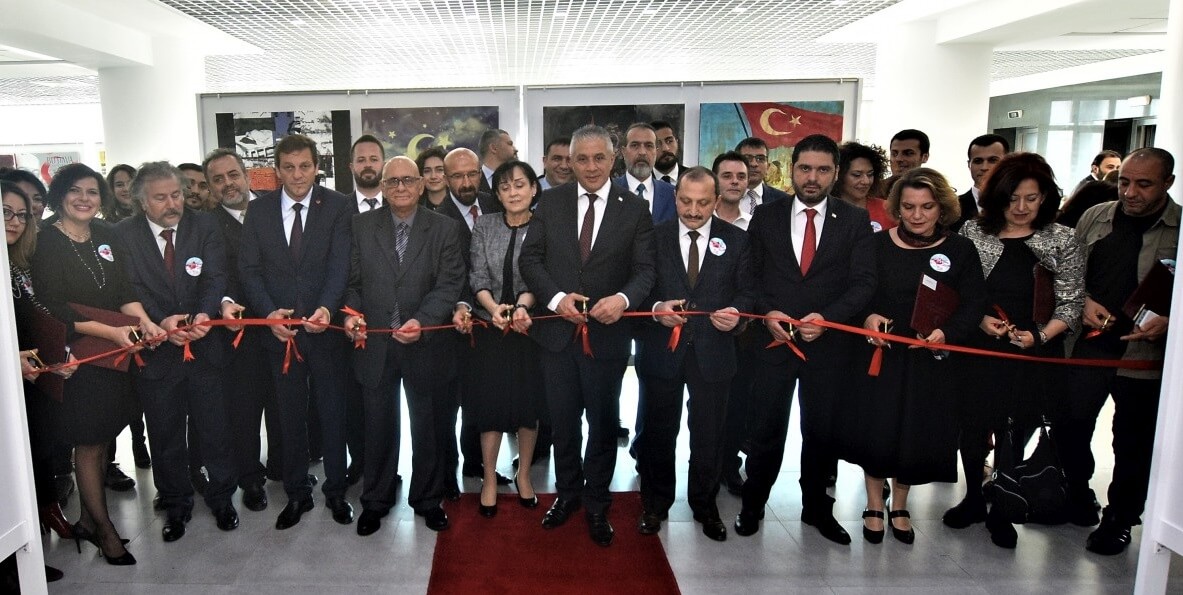 The exhibition titled “Artistic Traces of the Turkish Cypriots’ Existence Struggle” held on the occasion of 21-25 December National Struggle and Martyrs Week with the cooperation of Near East University and Gazi University was opened by Minister of Economy and Energy Hasan Taçoy